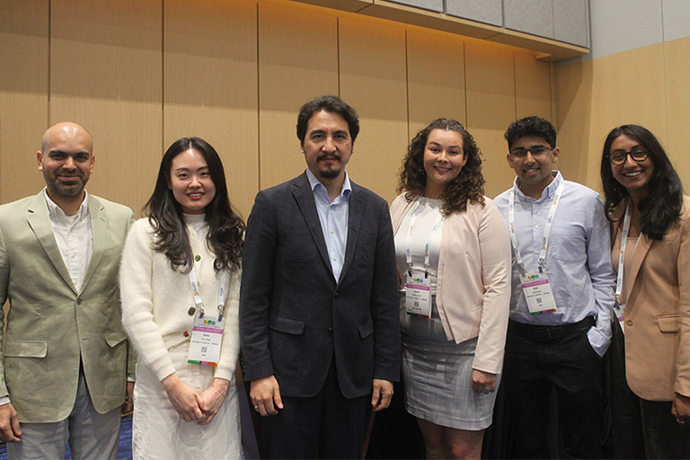six people who presented at the session on a i and transfer student success standing next to each other smiling at camera