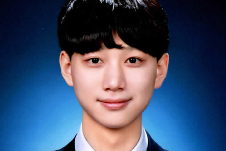 school psychology doctoral student Jin Hyung smiling at camera