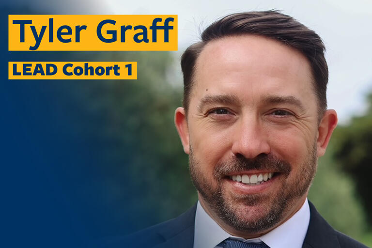 tyler graff smiling at camera with text in the top left reading tyler graff lead cohort one