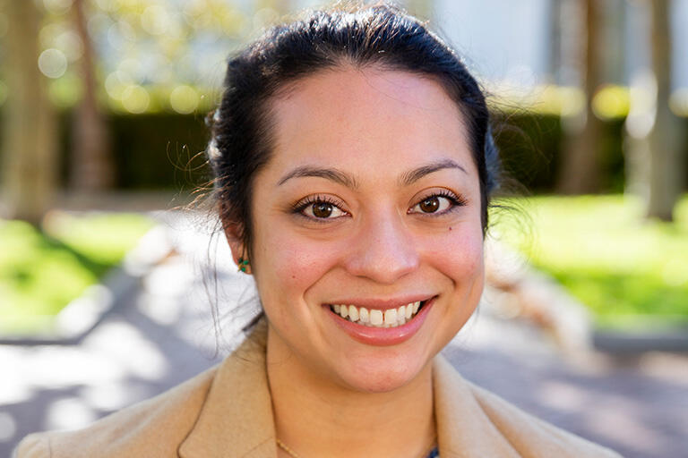 doctoral student Karen Villegas smiling at camera