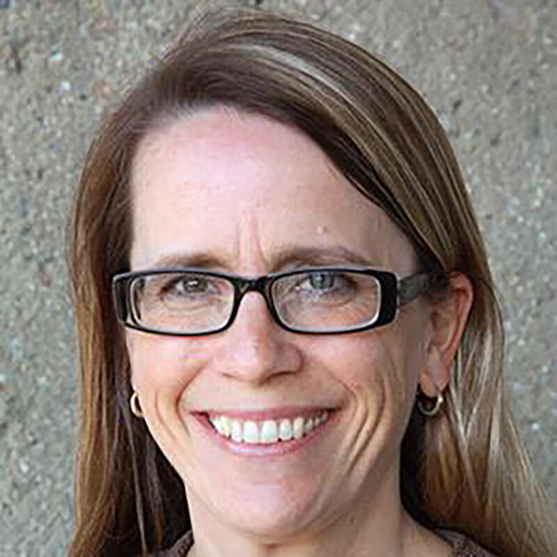 anne baranger smiling at camera