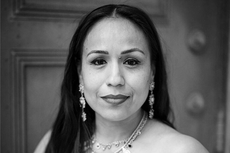 gina garcia looking at camera with stoic expression