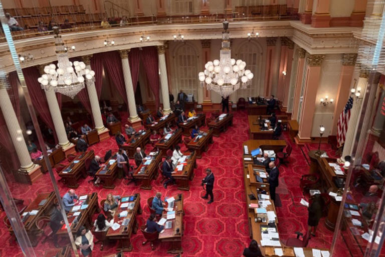looking down on the california state assembly floor in sacramento