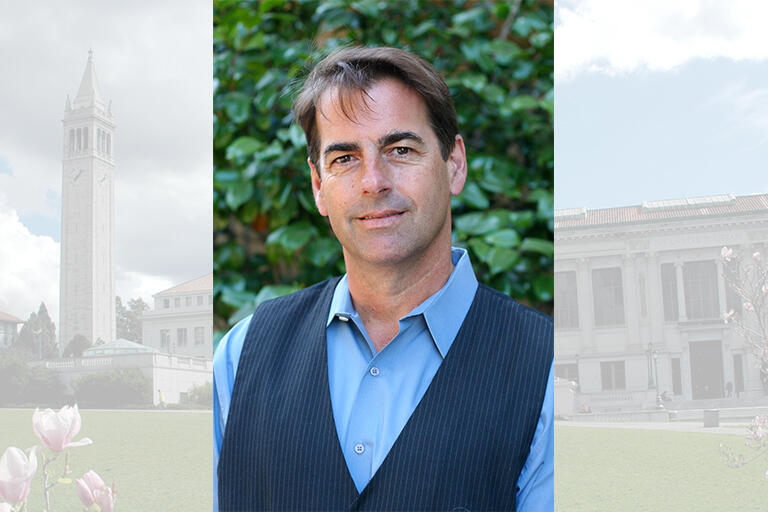 portrait of adjunct professor derek van rheenen in a blue button up shirt and dark blue vest