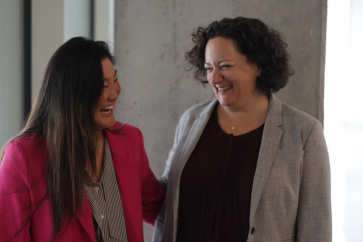 education leaders in one-on-one discussion