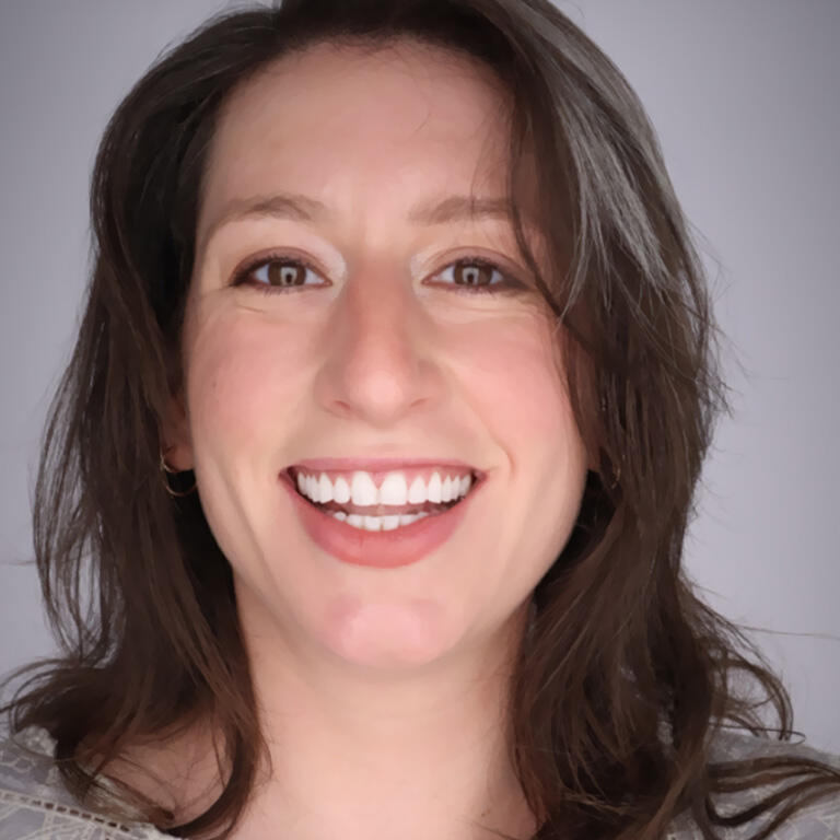 doctoral student emily reich smiling at camera