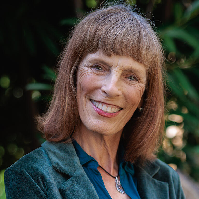 professor glynda hull smiling at camera