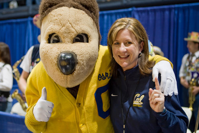 teresa gould with Cal Bears mascot Oski both smiling at camera