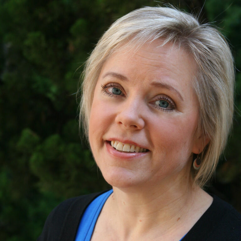 adjunct professor karen draney smiling at camera