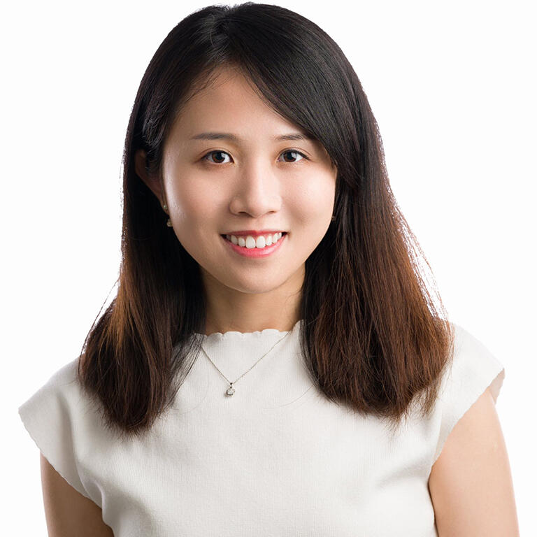 maggie chan smiling at camera