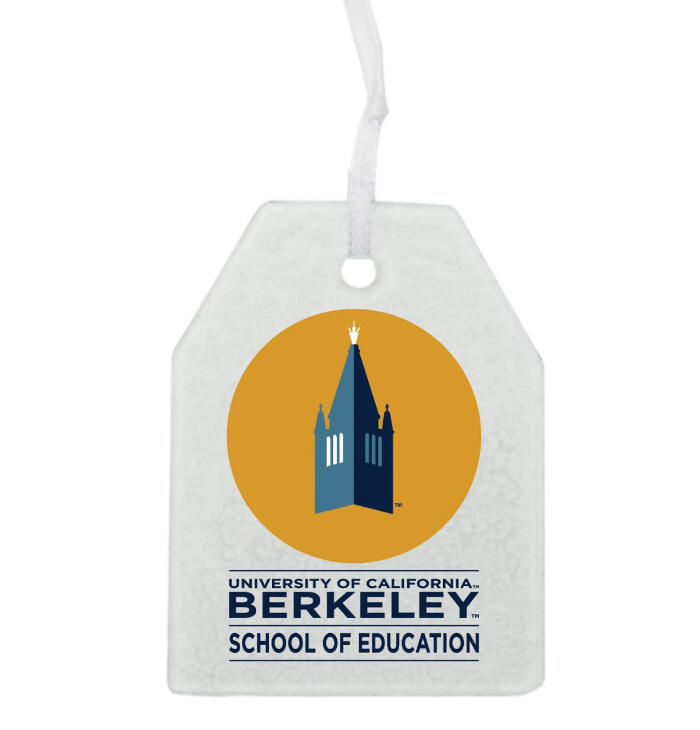 small ornament in shape of luggage tag with campanile logo and school of education text