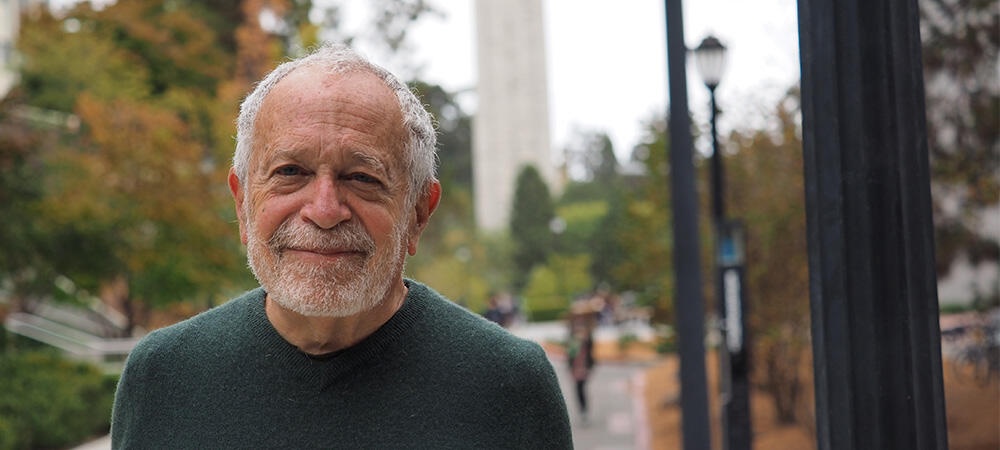 robert reich smiling at camera
