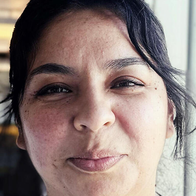 veronica vasquez smiling at camera