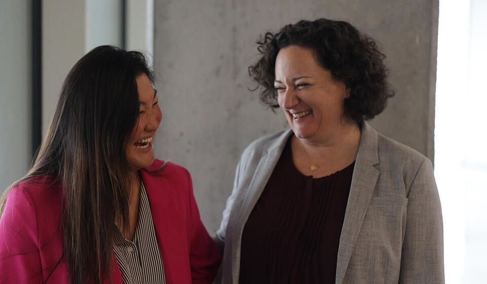 education leaders in one-on-one discussion